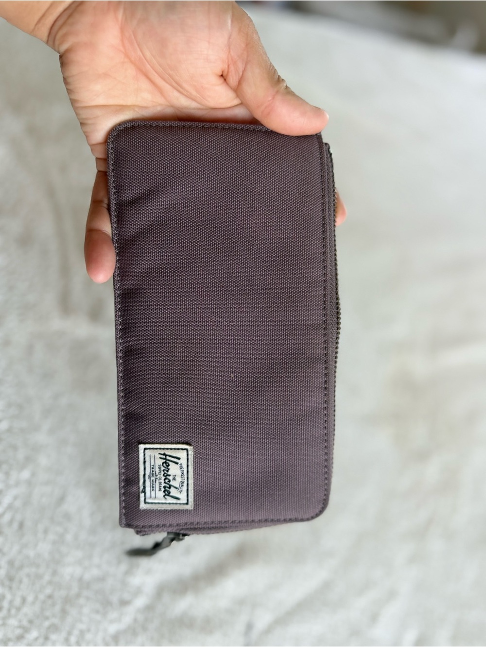 Herschel Supply Company zip-around wallet in muted plum
